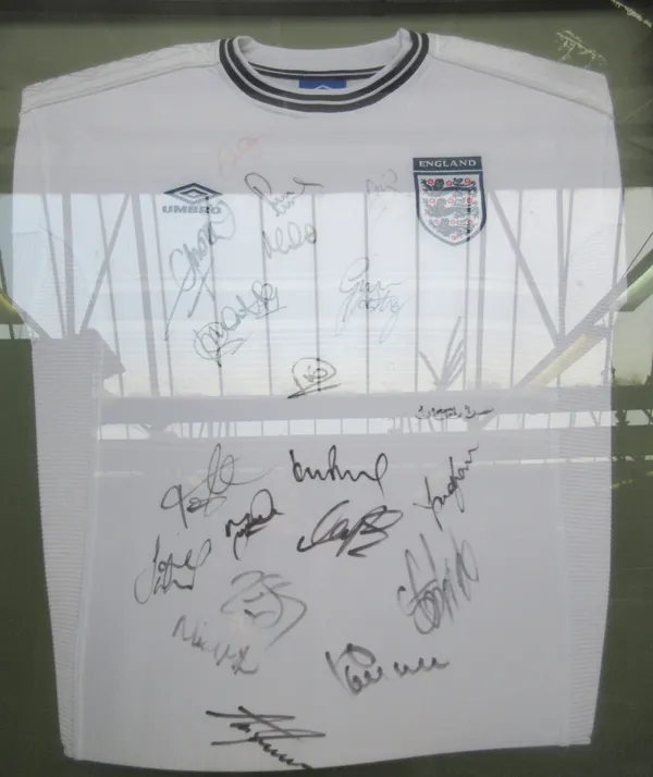 Sporting memorabilia; a signed England football shirt, England V Scotland 2000 European Championship Playoff, framed and glazed, 98cm x 90cm, an Engla