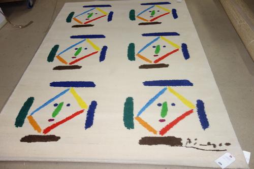 After Pablo Picasso; 'Gavilla de fábulas sin amor', wool rug with signature lower left and numbered  on a label on reverse, 45/500, 238cm x 171cm. Pub