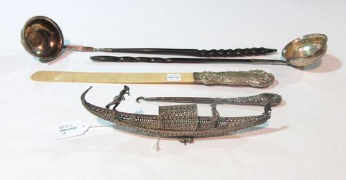 Silver and plated wares, including; A Victorian silver handled page turner, with embossed decoration, Birmingham 1898, a toddy ladle, the bowl mounted