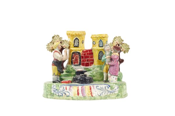 An unusual Staffordshire pearlware figure group, 'Gretna Green', circa 1830, in the manner of Obadiah Sherratt, depicting a blacksmith and couple in f