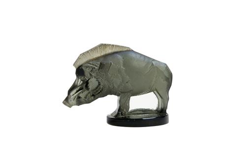 A Lalique clear and frosted grey glass 'Sanglier' car mascot, etched 'R. LALIQUE, FRANCE' to the circular base, (a.f), 6cm high.  Illustrated