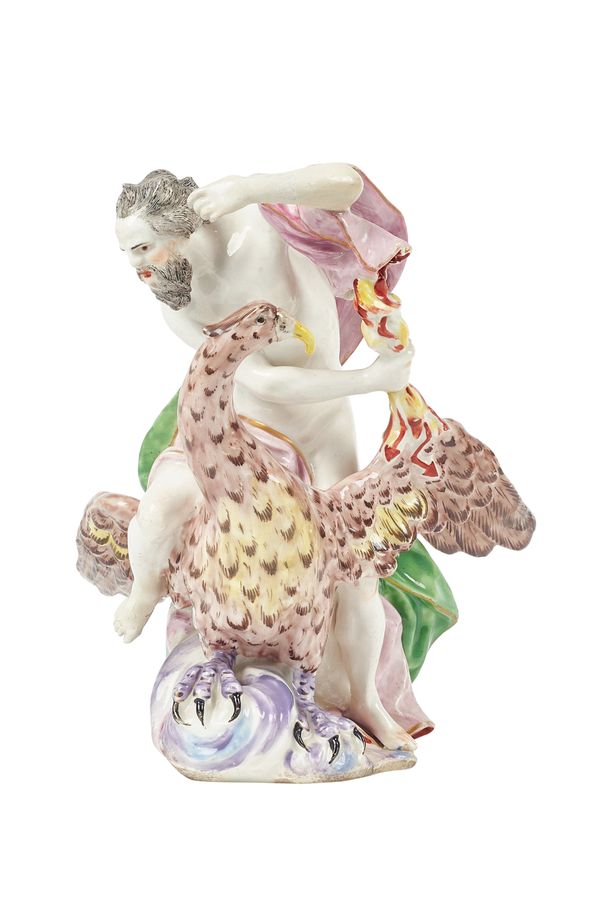 A Bow porcelain figure group, circa 1755, depicting Jupiter and the Eagle atop a naturalistic base, (a.f) 16cm high.  Illustrated