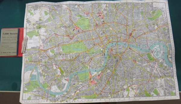 C. SMITH & SON'S  Tape Indicator Map of London.  62 x 90cms. colour-printed, folded on linen within cloth covers, scale 3 1/2ins. to mile, with the at