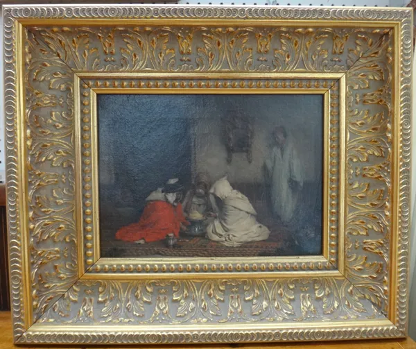 Continental School (19th centuruy), an Arabic interior with three figures eating, oil on canvas, 19cm x 25.5cm.