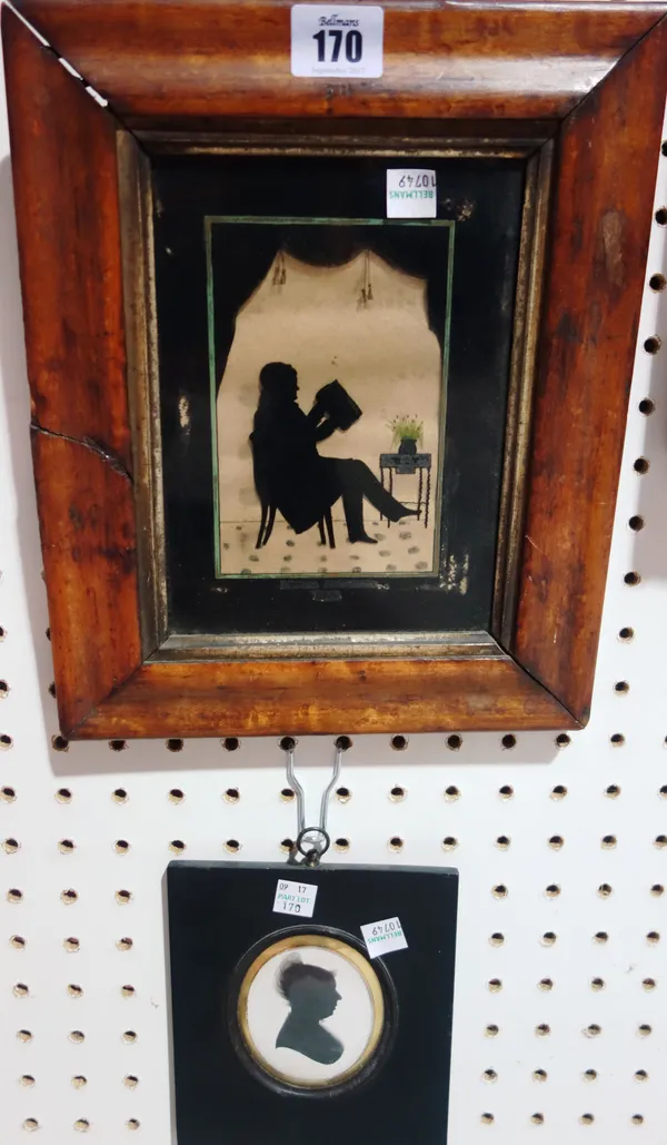 English School (19th century), A silhouette on glass of a gentleman seated in an interior, 14cm x 9cm; together with a silhouette of a lady, (2).   E1