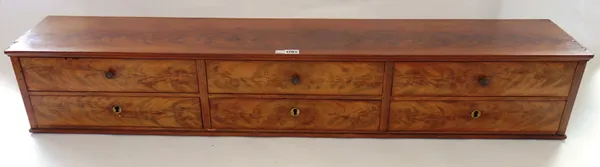 A 19th century mahogany bank of six short drawers,123cm wide x 21cm high.