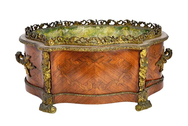A 19th century French gilt metal mounted marquetry inlaid kingwood jardiniere, of serpentine outline, 46cm wide x 20cm high.  Illustrated