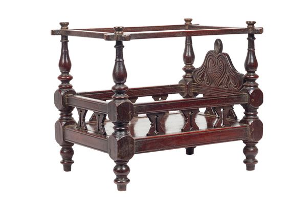 A late 19th century Anglo Indian hardwood miniature four poster bed/cat bed, with pierced sides and turned supports, 39cm wide x 28cm deep x 34cm high