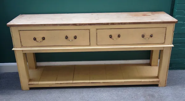 An early 19th century and later pine two drawer dresser base, with pot board undertier on block supports, 188cm wide x 87cm high.