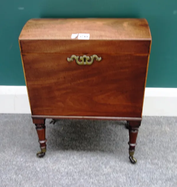 A George III mahogany dome top cellarette on turned supports, 38cm wide x 49cm high.