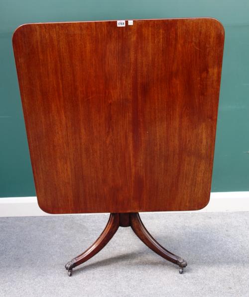 A George III mahogany rectangular snap top table, on three downswept supports, 87cm x 94cm.