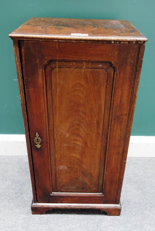 A made-up George III and later collector's cabinet, the slide-off arch panel door enclosing twelve graduated drawers, 41cm wide x 80cm high.