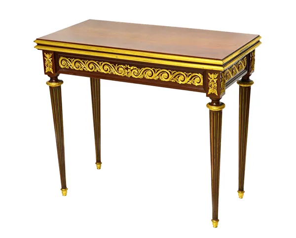 Henry Dasson, 1881; a French ormolu mounted mahogany concertina action rectangular card table, on tapering fluted supports, 86cm wide x 74cm high.  Il