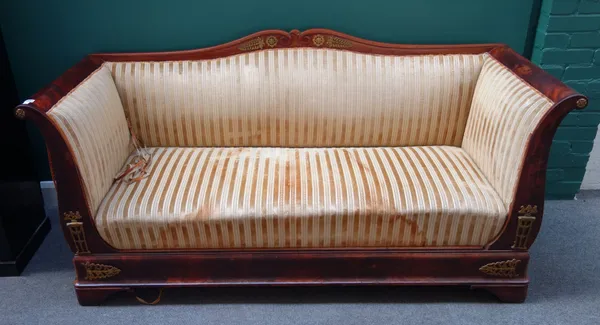 A Biedermeier gilt metal mounted mahogany scroll end sofa, 193cm wide x 95cm high.