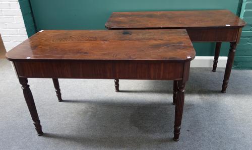 A pair of 19th century North European mahogany D-end dining table sections/consoles, on reeded supports, each 130cm wide.