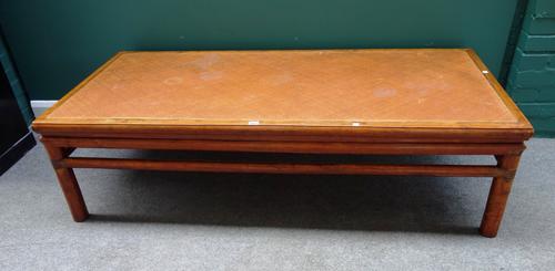 A late 19th/early 20th century Chinese hardwood day bed, with inset rattan panel on turned supports, 164cm wide x 77cm deep.