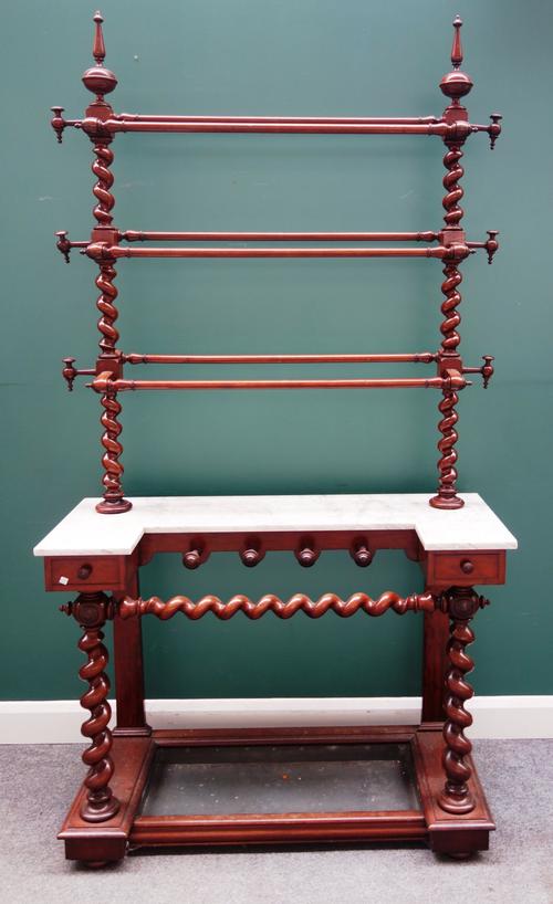 A Victorian mahogany hall stand, with barley twist and turned three tier upper section, over a marble topped stick stand base, also with barleytwist s