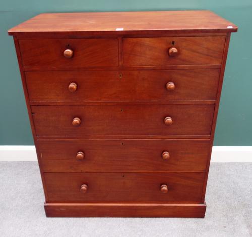 A 19th century mahogany tall chest of two short and four long graduated drawers, on plinth base, 107cm wide x 122cm high.
