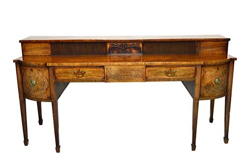 A George III Scottish inlaid mahogany sideboard, the stage back over five frieze drawers, on tapering square supports, 220cm wide x 111cm high.  Illus