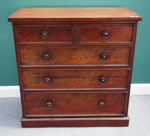 A mid-19th century mahogany chest of two short and two long drawers, on plinth base, 107cm wide x 108cm high.