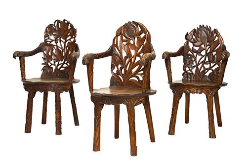 A set of five late 19th century Black Forest open armchairs, each with foliate carved backs and solid seat, all approximately 55cm wide x 99cm high, (