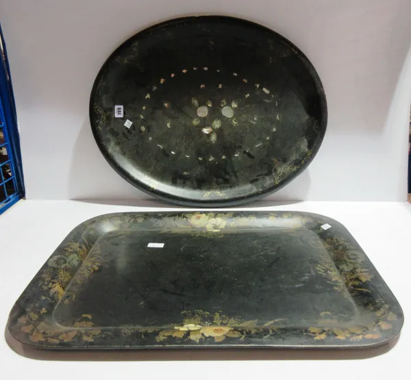 A 19th century black tole painted rectangular metal tray and a mother of pearl inlaid papier mache oval tray, (2).   S7T