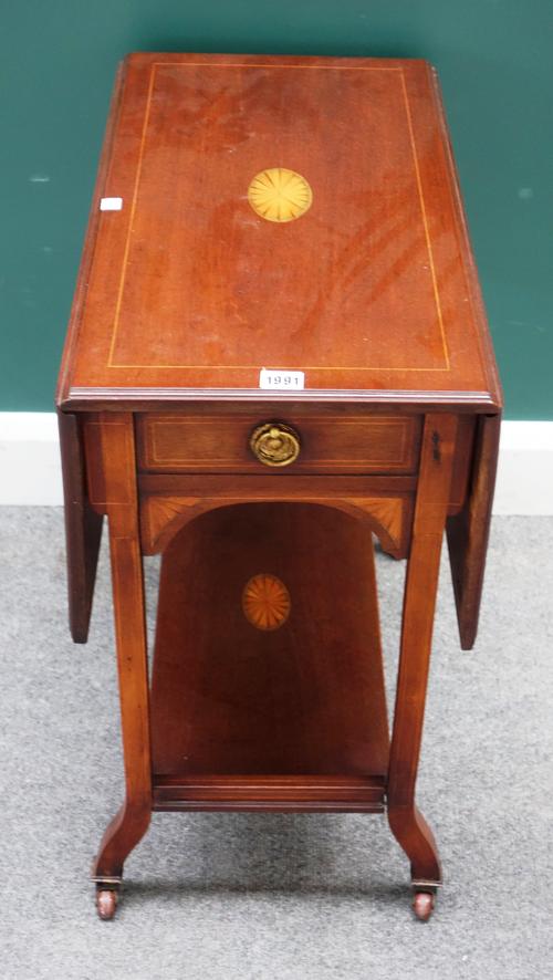 An Edwardian inlaid mahogany Sutherland table, on splayed square supports united by platform undertier, 61cm wide x 34cm across, 81cm across opened.
