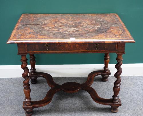 A William & Mary floral marquetry oyster veneered rectangular side table with single frieze drawer on barleytwist supports, united by X-frame stretche