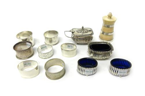 Silver and silver mounted wares, comprising; an ivory peppermill, Birmingham 1934, a pair of oval small salts, having blue glass liners, Birmingham 19