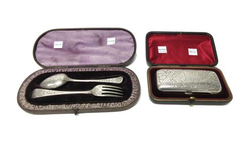 Silver, comprising; a rectangular hinged purse, with feathered scroll engraved decoration, presentation inscribed, Birmingham 1902, with the original