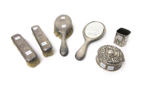 Silver and silver mounted wares, comprising; a circular hinge lidded trinket box, the lid having embossed decoration, Birmingham 1978, a scent bottle