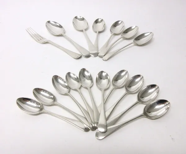 Silver Old English pattern table flatware, comprising; four dessert spoons, two table spoons and one table fork, Sheffield 1924 and ten teaspoons by E