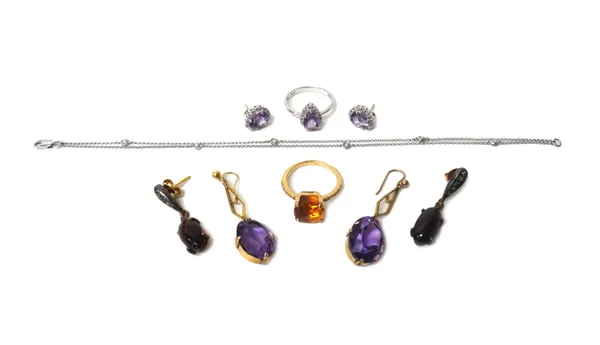 A white gold and diamond set two row chain link bracelet, on a sprung hook shaped clasp, detailed '375', a pair of amethyst pendant earrings, each dro