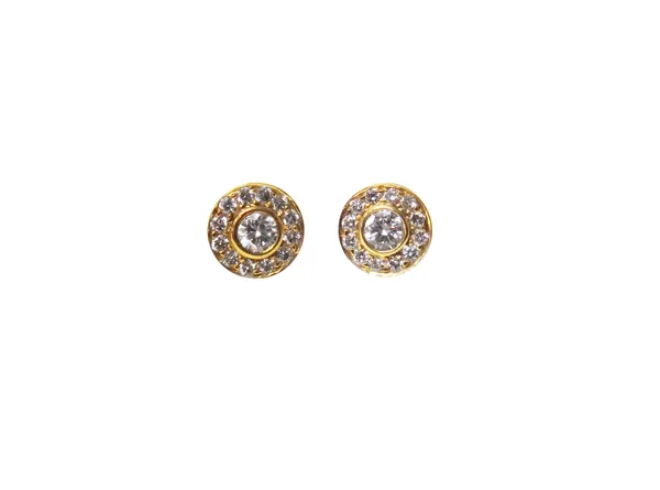 A pair of diamond set cluster ear studs, each mounted with the principle circular cut diamond at the centre, in a surround of small circular cut diamo