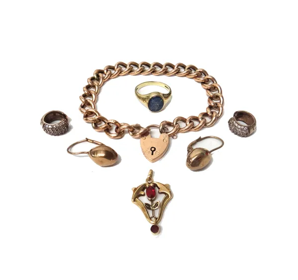 A gold curb link bracelet, with a gold heart shaped padlock clasp, detailed 9 CT, weight 9.6 gms, a 9ct gold ring, mounted with an oval opal triplet,