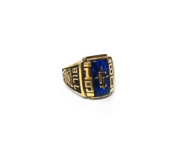 A gold and blue gem set college style ring, detailed Bill Eagles 1980 and Keystone 10 K, ring size W and a half, gross weight 13 gms.  Illustrated