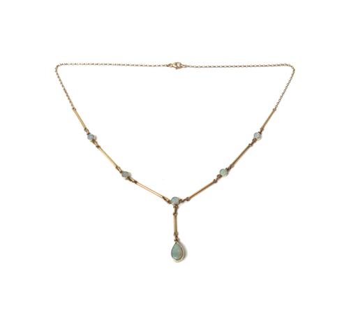 A 9ct gold and opal pendant necklace, the drop collet set with a pear shaped opal, otherwise mounted with five smaller circular opals above, connected