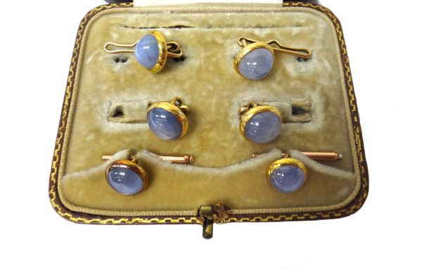 A set of four cabochon sapphire set dress buttons and two matching cabochon sapphire set dress studs, with an associated case (lacking cufflinks).