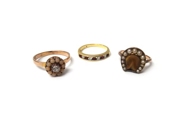 A gold, diamond and pale coral set cluster ring, a gold, tiger's eye and seed pearl set ring, designed as a horse's hoof and an 18ct gold, diamond and