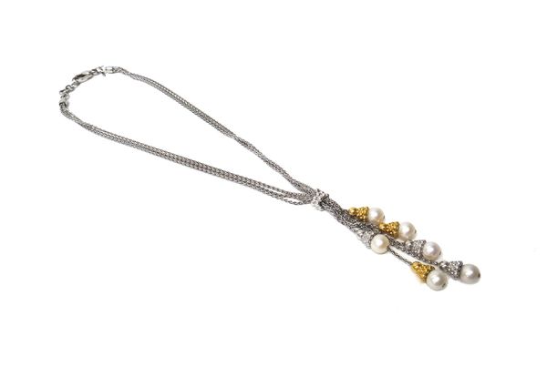 A white gold and yellow gold diamond and cultured pearl multiple pendant necklace, the front with three white gold and diamond capped cultured pearl d