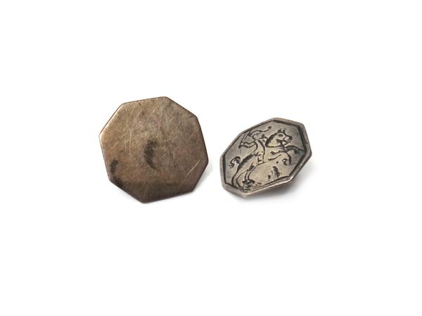 Seven similar octagonal buttons, each cast with a figure in 18th century costume on horseback, probably North European, second half 19th century, widt