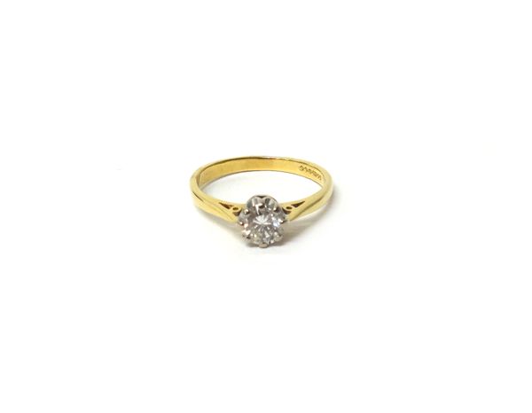 An 18ct gold and diamond single stone ring, claw set with a circular cut diamond, the diamond weighs approx. 0.50cts, ring size N.