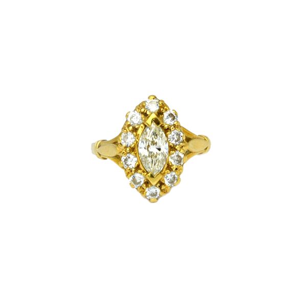 An 18ct gold and diamond set marquise shaped cluster ring, mounted with the principal marquise diamond at the centre, in a surround of circular cut di