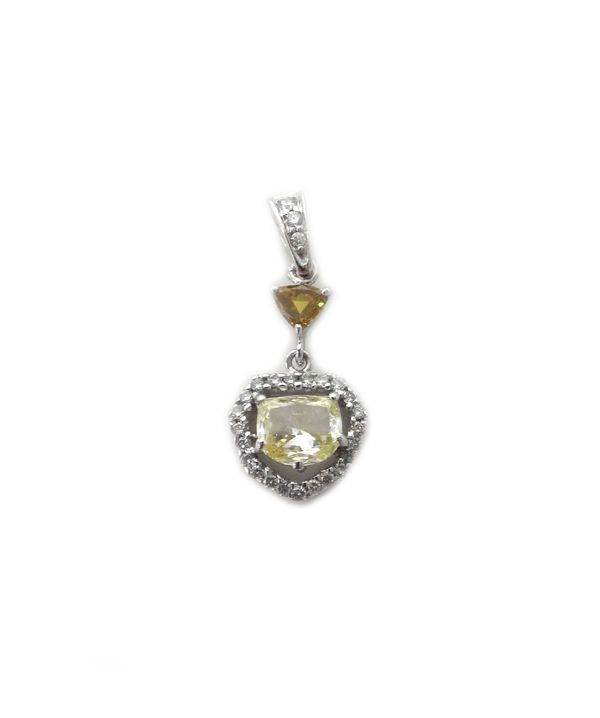 An 18ct white gold and diamond pendant, mounted with a pale yellow D-shaped diamond at the centre of the drop, in a pierced openwork surround set with