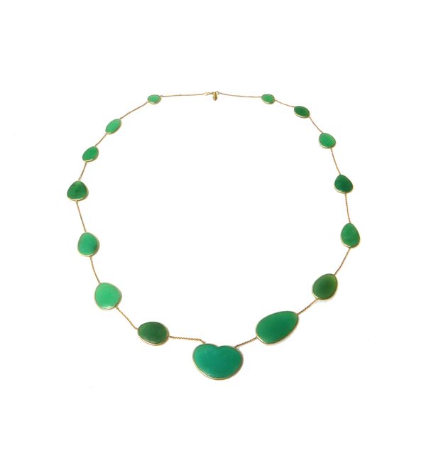 An 18ct gold and chrysoprase necklace, mounted with a row of graduated variously shaped chrysoprase discs and with a heart shaped disc at the front, o