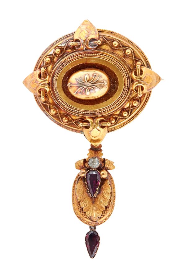 A Victorian shaped oval gold brooch, with applied bead and wirework decoration in the classical taste, the back glazed with a locket compartment, the