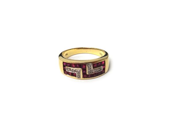 A gold, diamond and calibre cut ruby set ring, in a Greek key pattern design, detailed 750, ring size O, gross weight 5.8 gms.