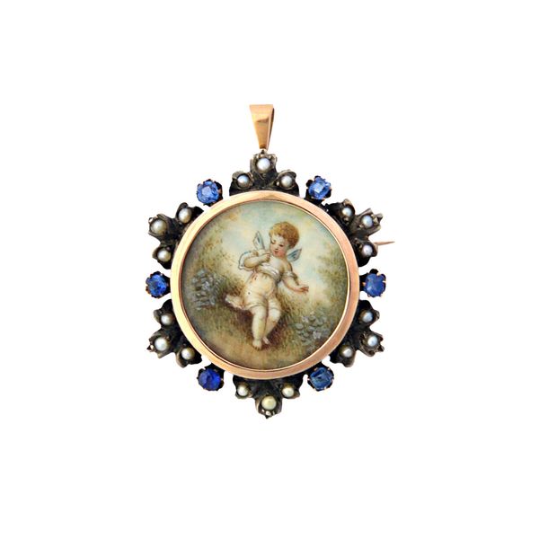 A French sapphire and seed pearl set shaped circular pendant brooch, glazed with a circular miniature depicting a cherub in a landscape, diameter 3cm.