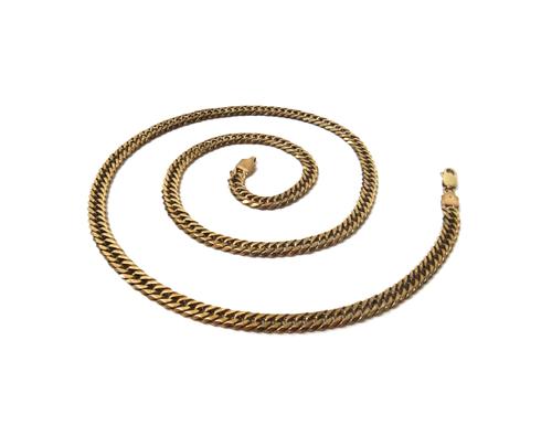 A 9ct gold solid faceted curb link neckchain with a sprung hook shaped clasp, weight 39.5 gms.