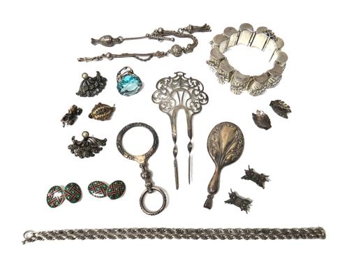 A pair of silver and enamelled oval cufflinks by Asprey, a small hand mirror fitted as a pendant, a spy glass detailed '925', a pale blue paste set ri